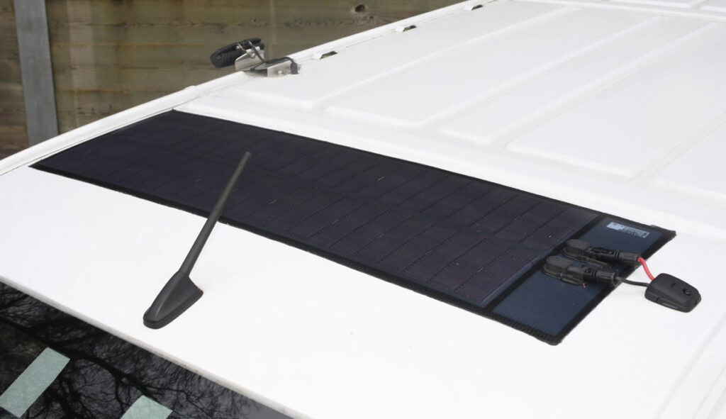 Genie Insights 50 watt solar panel on EV van roof with top mounted connectors
