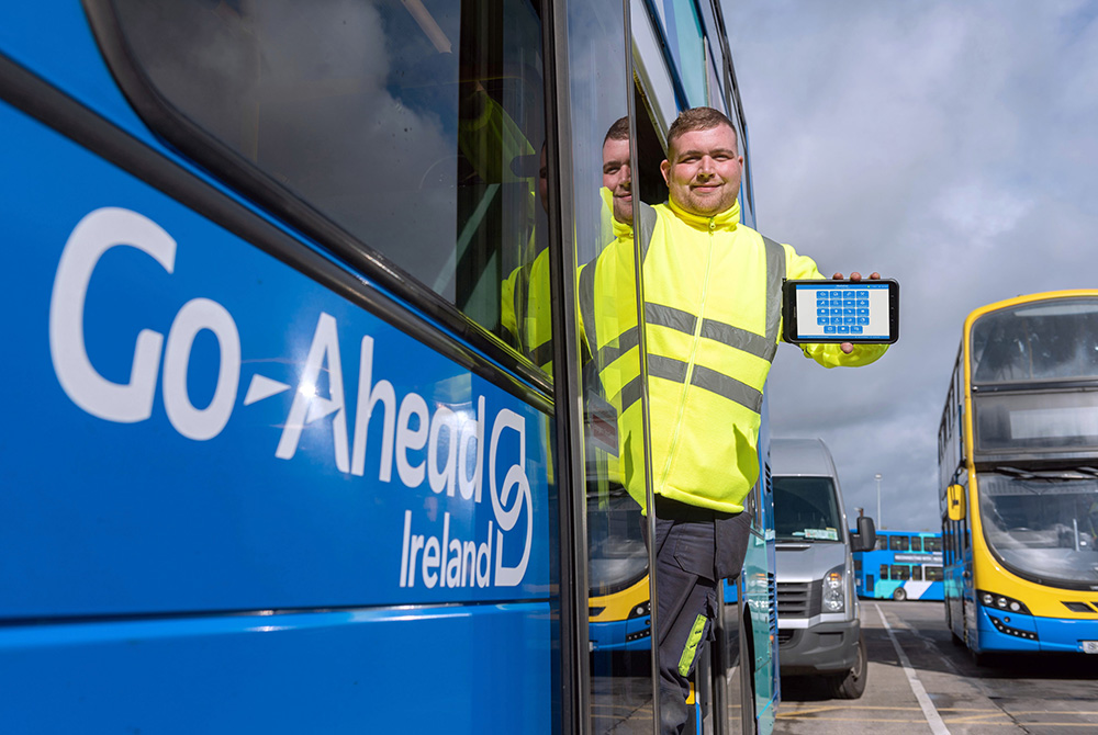 A Go-Ahead Ireland engineer using a tablet to access Freeway Fleet Systems