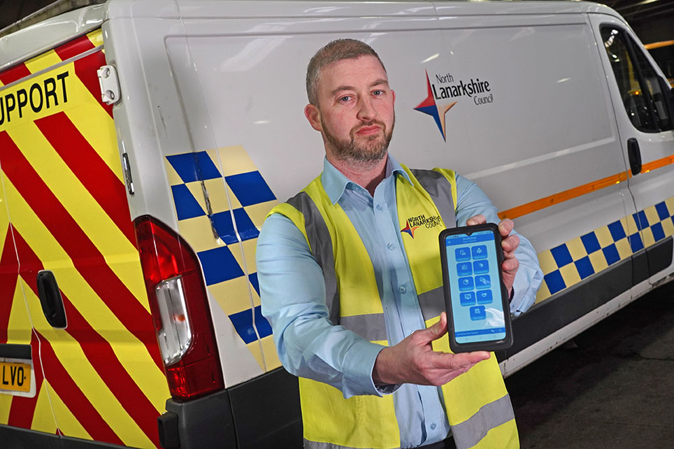 A North Lanarkshire Council engineer using a tablet to access Freeway Fleet Systems